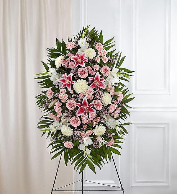 Pink &amp; White Funeral Standing Spray - The warmth and kindness they showed will live on forever, and sometimes this sentiment is best captured through flowers. Our classic standing spray arrangement is elegantly crafted with soothing pink and white blooms for a lush, full presentation, creating a truly memorable tribute to someone so loved.