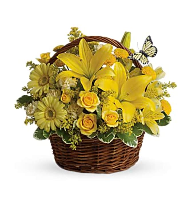 Basket Full of Wishes Florist choice - Basket arrangement of florist choice flowers. will be similar to photos but of what florist decides.  List what occasion the order is for and florist will make it to fit that occasion. 