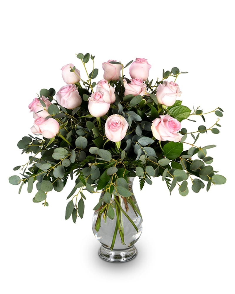 Luxurious - TMF-1175 - She's your uptown girl. Luxurious will add that special touch when you say &quot;I love you!'. Our Bella vase is accented with pink roses and Eucalyptus for a high society statement of you love. Approximately 25&quot; W X 29&quot; H
