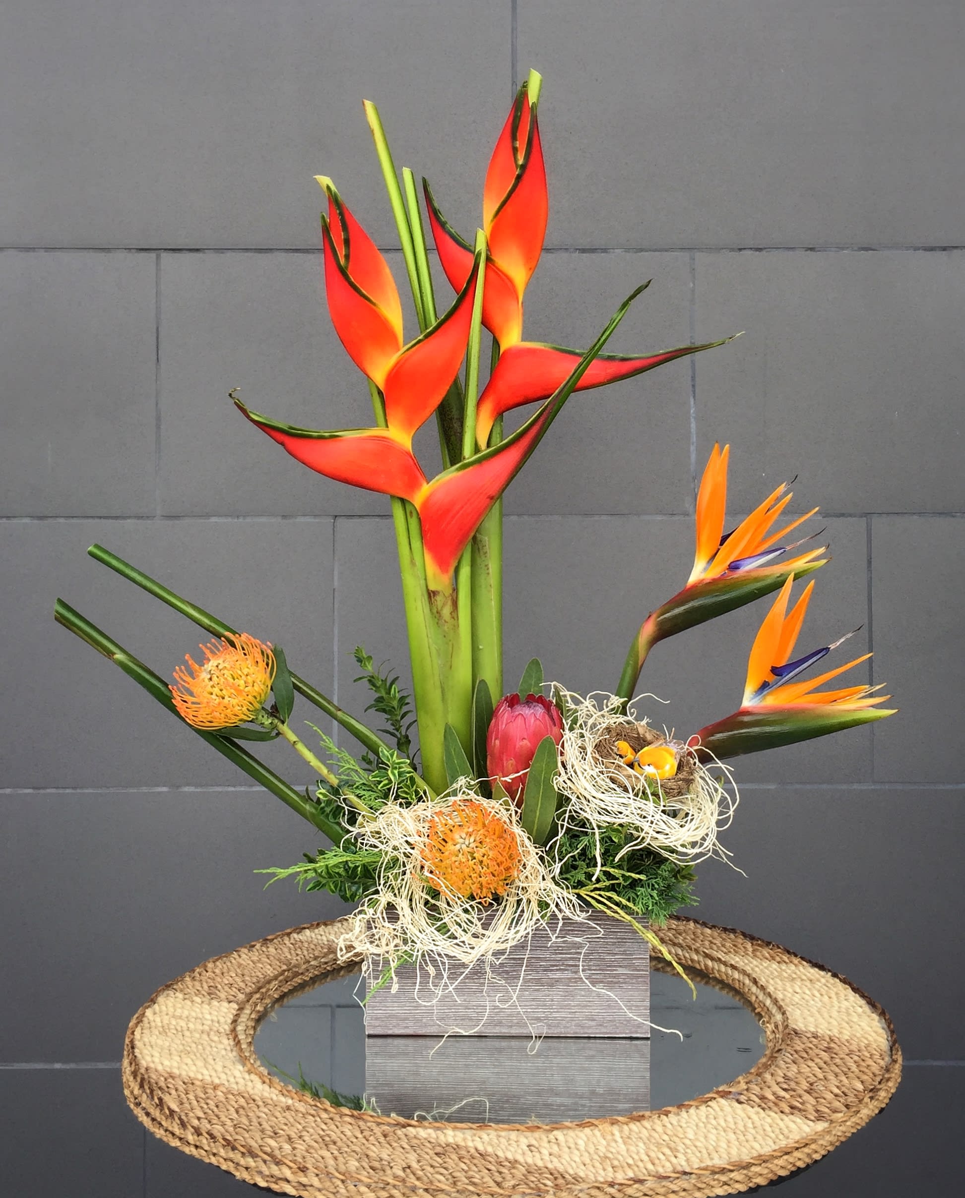 Lovely Bird's Nest - Exotic tropical design including heliconia, protea... bird's nest and nice accents.
