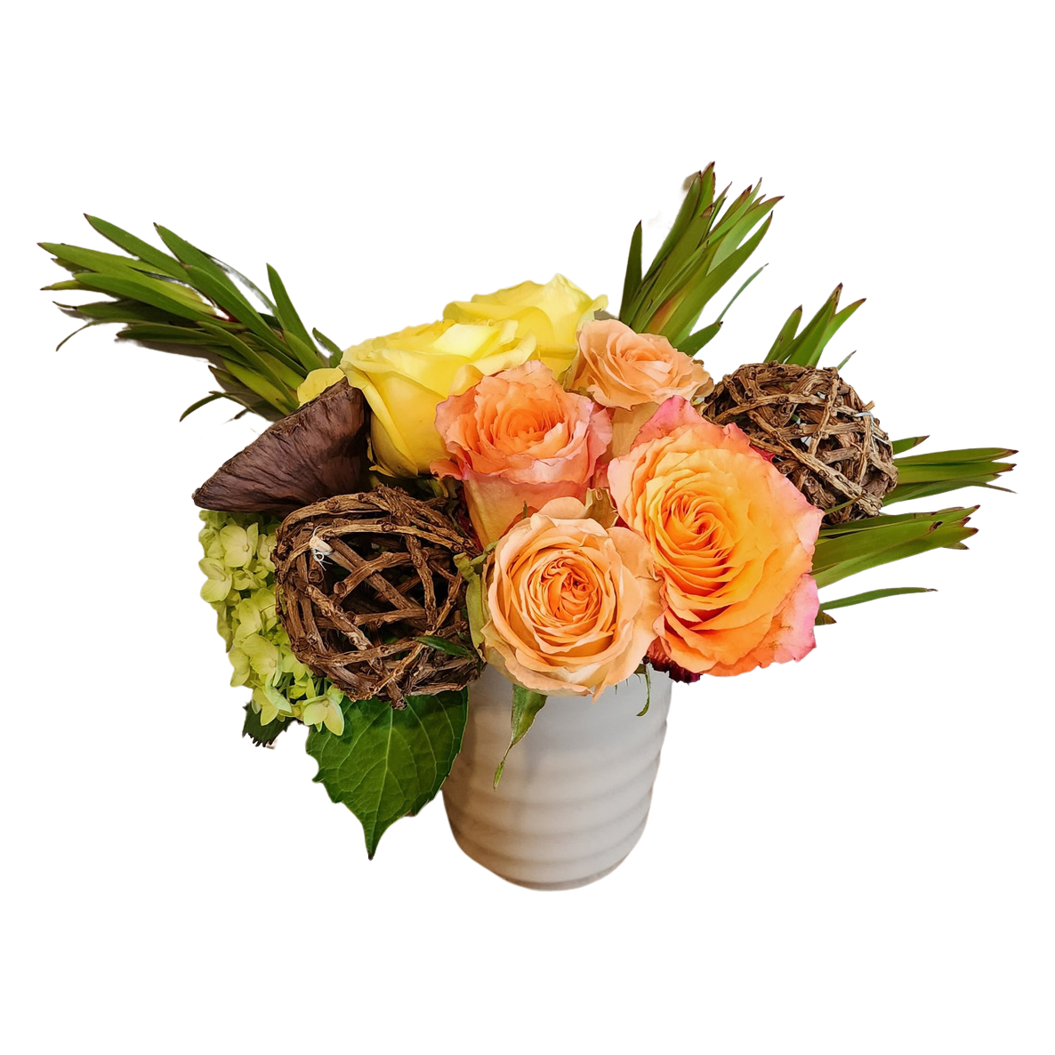 Fall flirt Fall flirt - A great table top arrangement with lotus , grapevine balls. Hydrangea and orange and yellow roses. Flowers may be slightly different