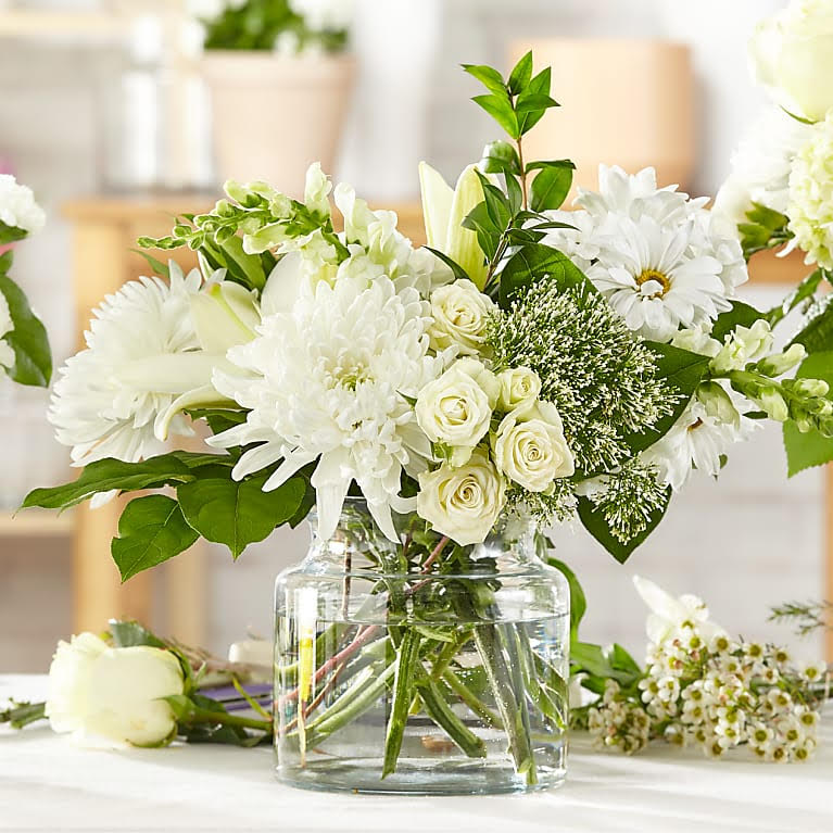 Elegant Ivory Elegant Ivory - A simple white arrangement. From $60.