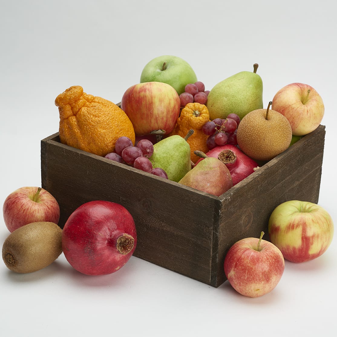 Seasonal Fresh Fruit Crate , also available in organic - A wonderful presentation for this fresh fruit crate. We use prime seasonal fruits for this Crate . Some ripe for immediate consumption and some to be eaten later. Organic Will have less variety