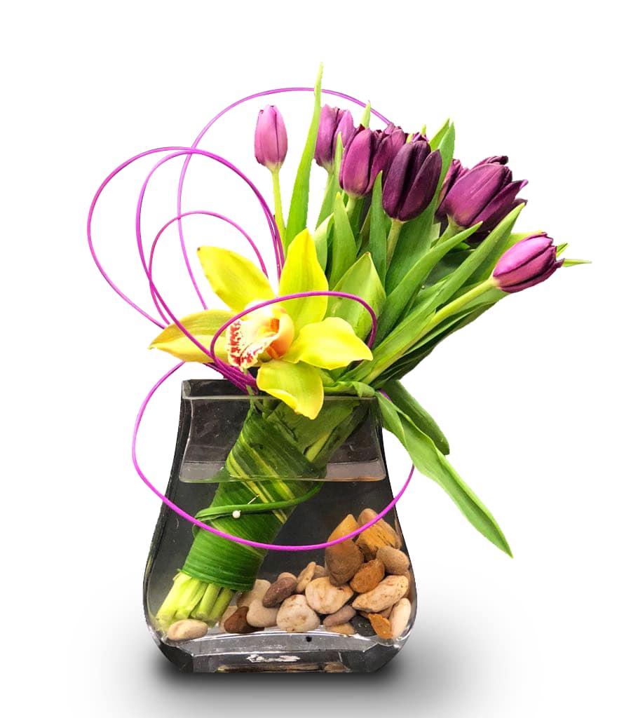 Purple Tulips By Newport Florist NF288 - Pure lovely. Long-stemmed purple tulips. This bouquet is a timeless symbol of your singular love. Includes ten purple tulips.  All-Around