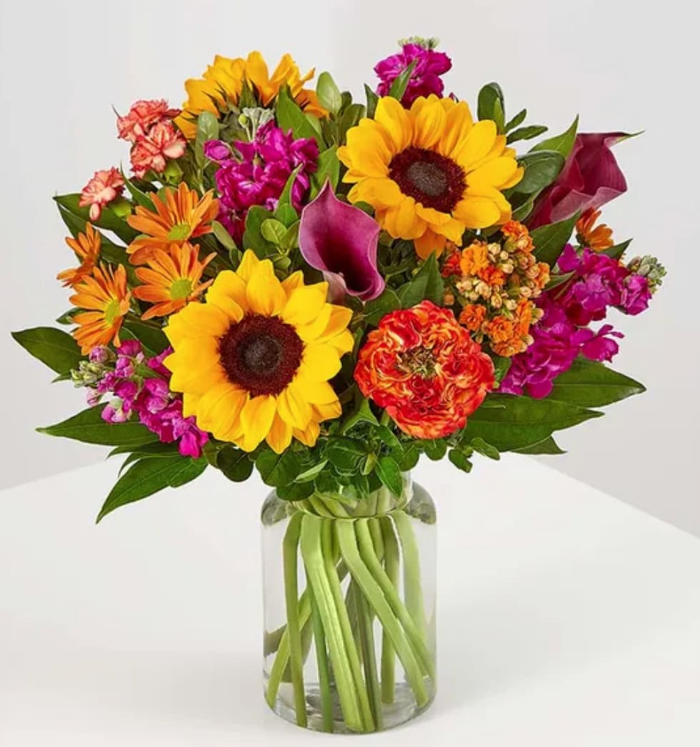 Autumn Enchantment by Jason Wu for Wild Beauty - Elevate their autumn style with our bold blend of blooms. Created in partnership with designer Jason Wu, this hand-gathered arrangement highlights classic and trending color palettes, while celebrating the season in the most enchanting way.