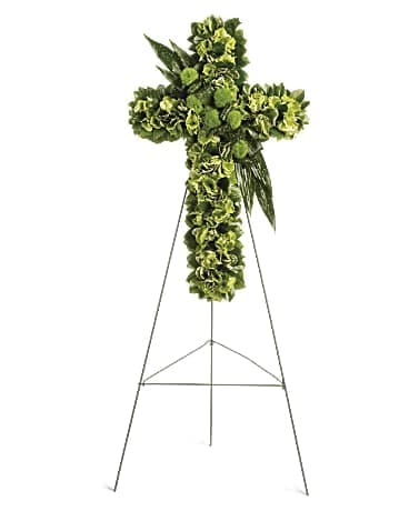 Garden Cross Garden Cross - Stunningly simple, this lovely floral cross is a beautiful addition to the memorial service, honoring someone for whom faith was an essential part of life. The exquisite arrangement includes green hydrangea, green trick dianthus, variegated pittospourum, accented with Israeli ruscus and other assorted greenery. Orientation: One-Sided