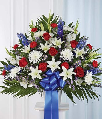 Red white & blue sympathy Arrangement Red white & blue sympathy Arrangement - Red white and blue flowers
