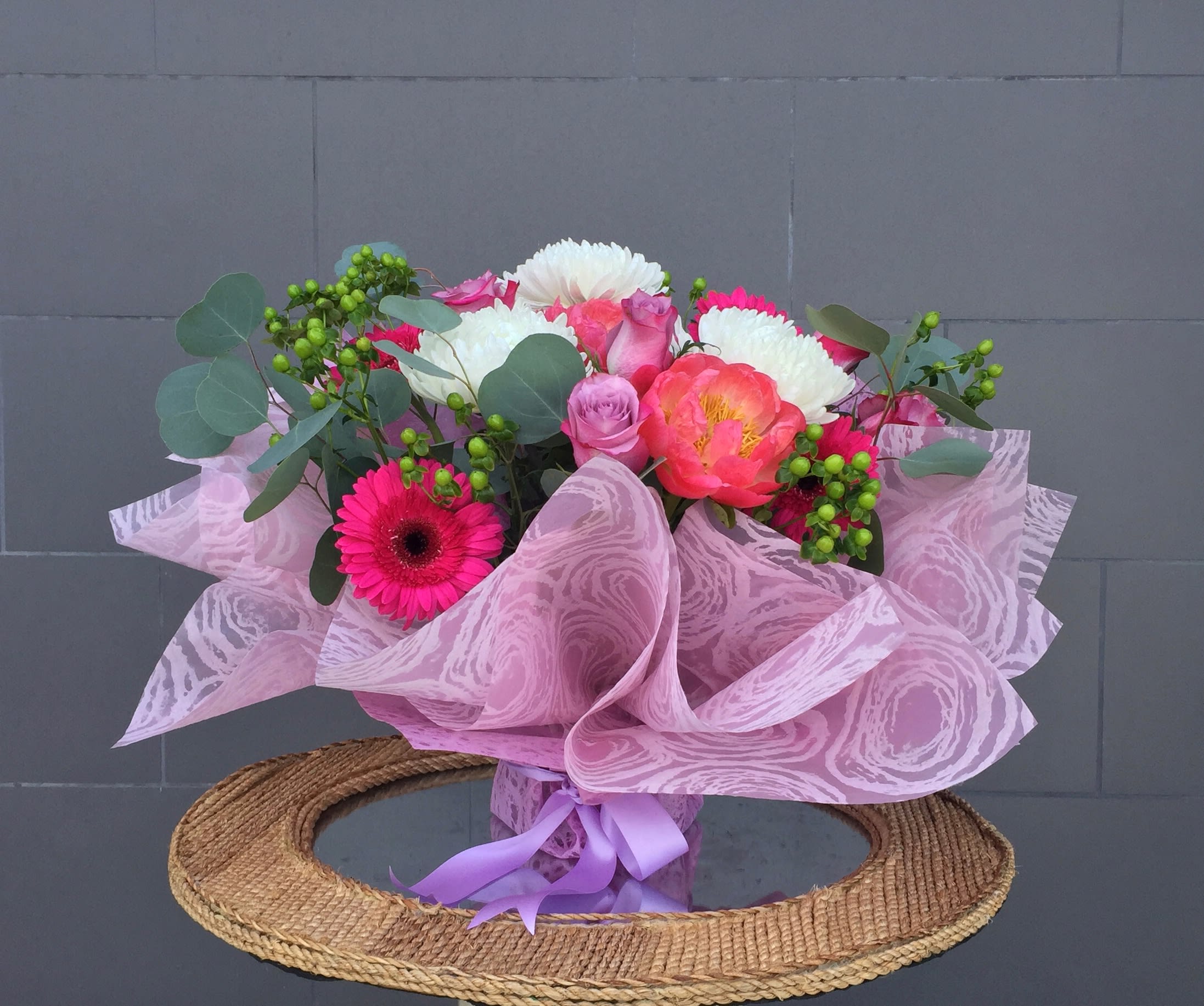 Lovely Wrapped Bouquet - Lovely bouquet including rose, gerbera... and accents is good for all occasions.