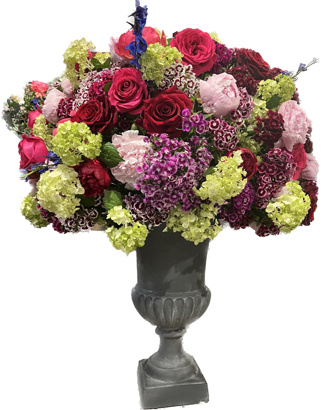 The Sequoia The Sequoia - The Sequoia Arrangement is a bold, modern statement piece with a color palette that speaks to the changing seasons. A dazzling combination of pink peonies and orange roses are set in a an urn making this arrangement a favorite for Mother's Day and anniversaries alike.