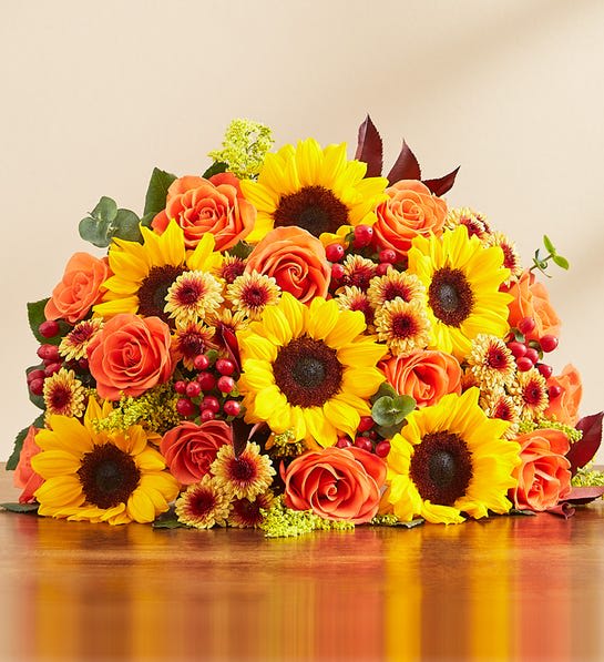 Deal of the Day Florist Choice Centerpiece - Designer one-of-a-kind  Florist Choice Thanksgiving Centerpiece using the freshest seasonal flowers available. You can feel confident knowing an expert floral designer will create an unforgettable flower arrangement that you can be sure will delight! Picture shown reflects Deluxe $49.99 price point.
