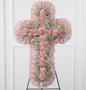 Angel's Cross - Simply beautiful cross of mini carnations &amp; babies breath.  Colors can be changed as well as a ribbon &amp; script can be added.  Approx. 24&quot;h x 15&quot;w.