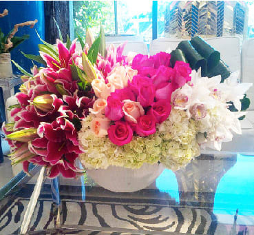 Lily Jewel - Fragrant Magenta Lilies, Hot Pink &amp; Pale Peach Roses, White Orchids and hydrangeas. A stunning table piece