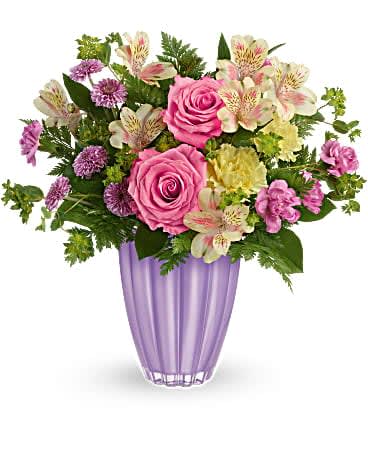 Afternoon Tea Bouquet - Fresh as a spring day, this glorious pink and yellow bouquet looks stunning in this European glass keepsake vase that's set off with a shimmering pastel metallic finish. This colorful gift includes dark pink roses, yellow alstroemeria, yellow carnations, miniature pink carnations, lavender button spray chrysanthemums, bupleurum, leatherleaf fern and lemon leaf. Delivered in a Playful Pastel vase.  