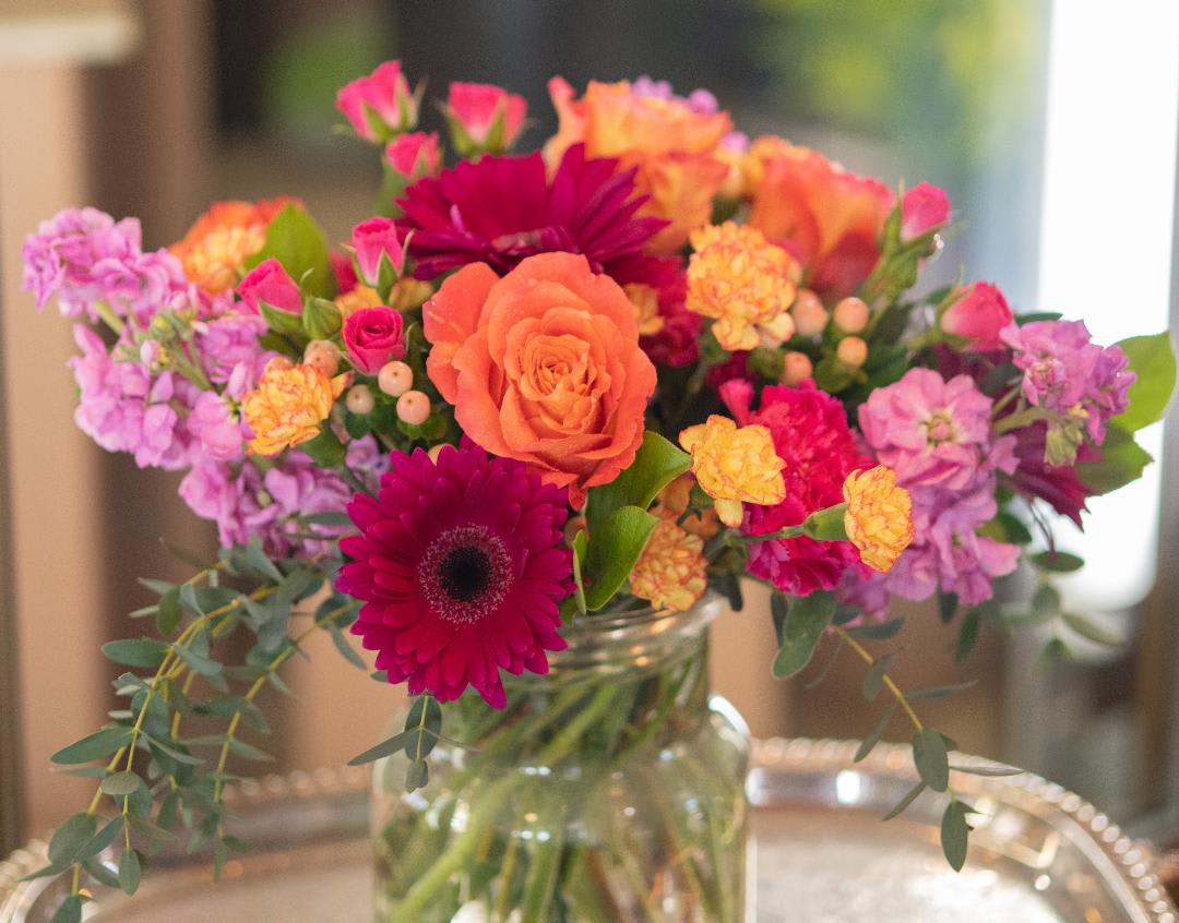 Warm Wishes - Wish someone a good day, everyday. Roses, gerberas, gilly flowers, and elegance will help you make that wish come true.