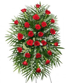 Red Rose Standing Spray by Joni - Classic, fresh-cut red roses with accents of eucalyptus and other fresh foliage are featured in this beautifully-traditional spray. Let RILEY'S FLOWERS &amp; GIFTS deliver a lovely floral expression of sympathy and reverence for you. 