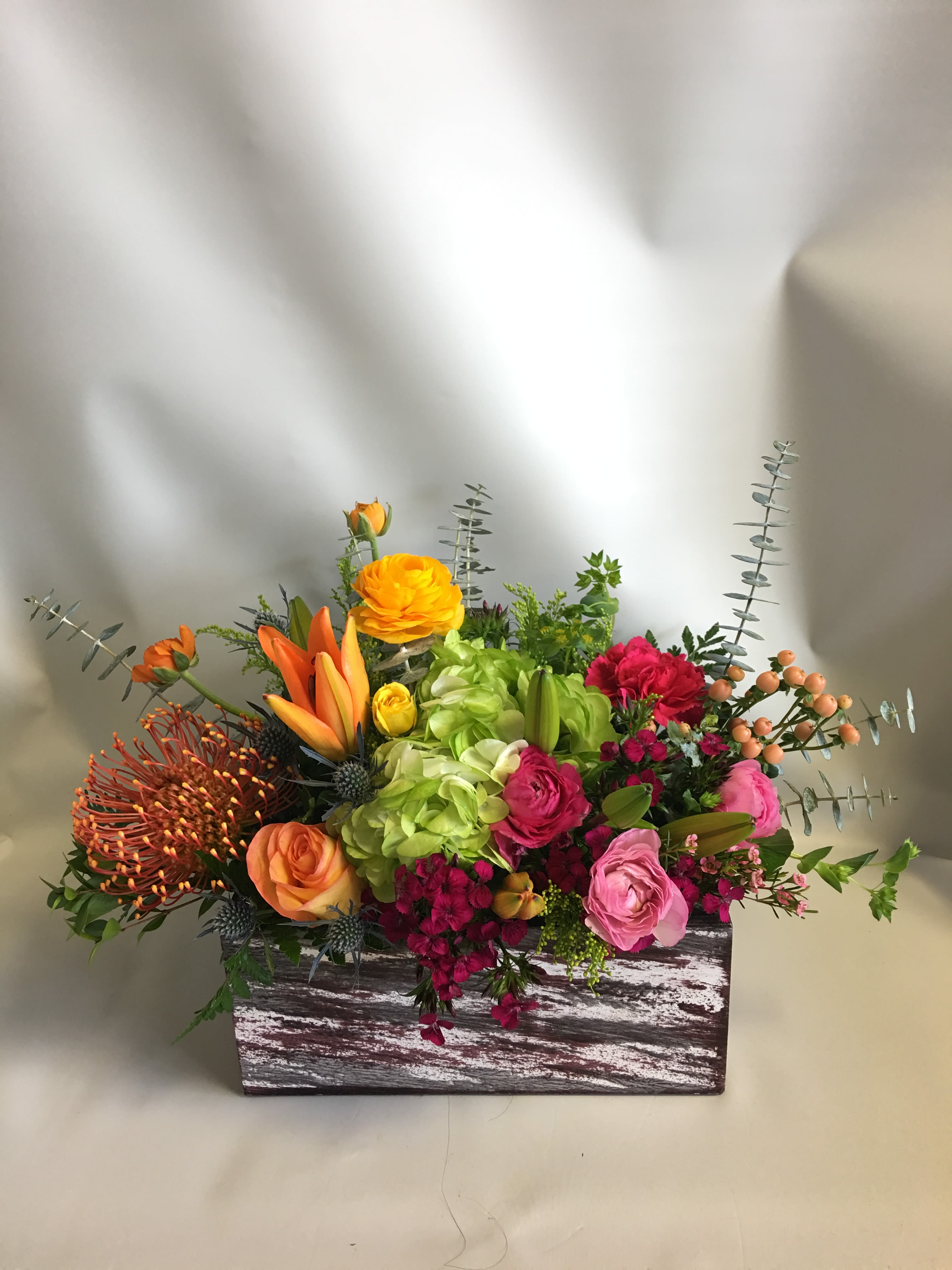 Garden Basket   - Mixed of spring color flowers. 