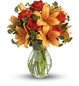 Fiery Lily and Rose by Teleflora - Spark someone's attention by sending this absolutely radiant bouquet. Full of flowers and fiery beauty, it makes a beautiful gift for any occasion.
