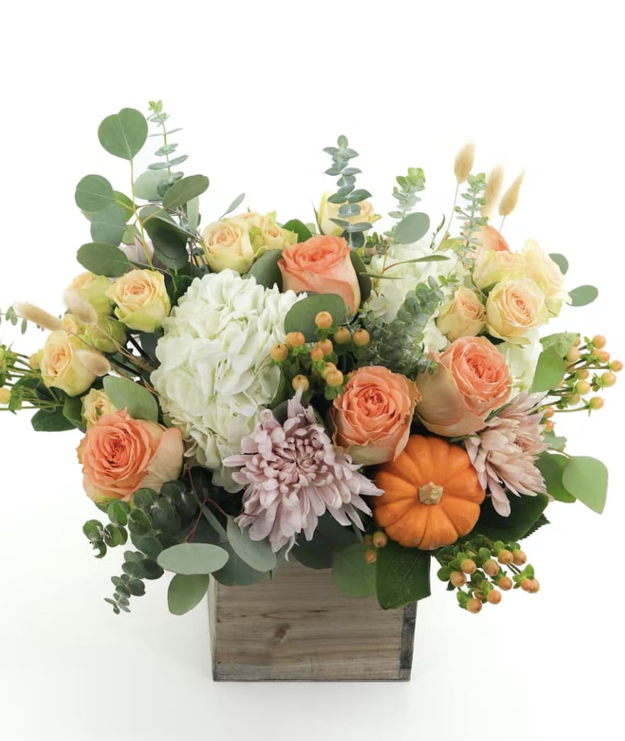 Accent on  Peachy Fall Florals - Roses and Eucalyptus and a little pumpkin too. 