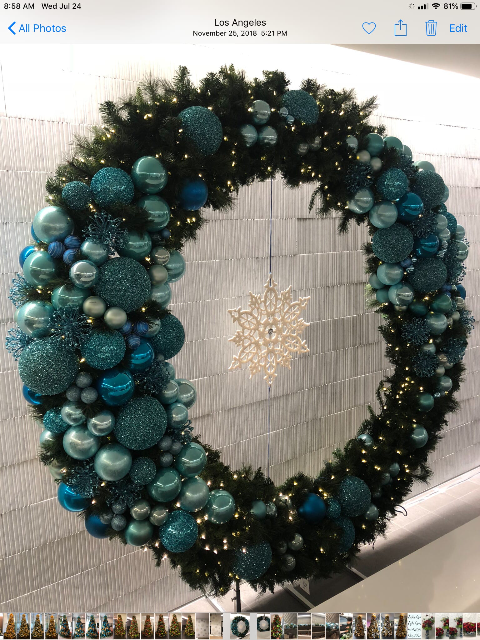 Blue Wreath #CW11 -  Free standing 8-9' Blue &amp; Silver Christmas Wreath designed elegantly with top quality ornaments. One of a kind &amp; eye catching Christmas decor    Fro perches or rental ( this is a rental price)