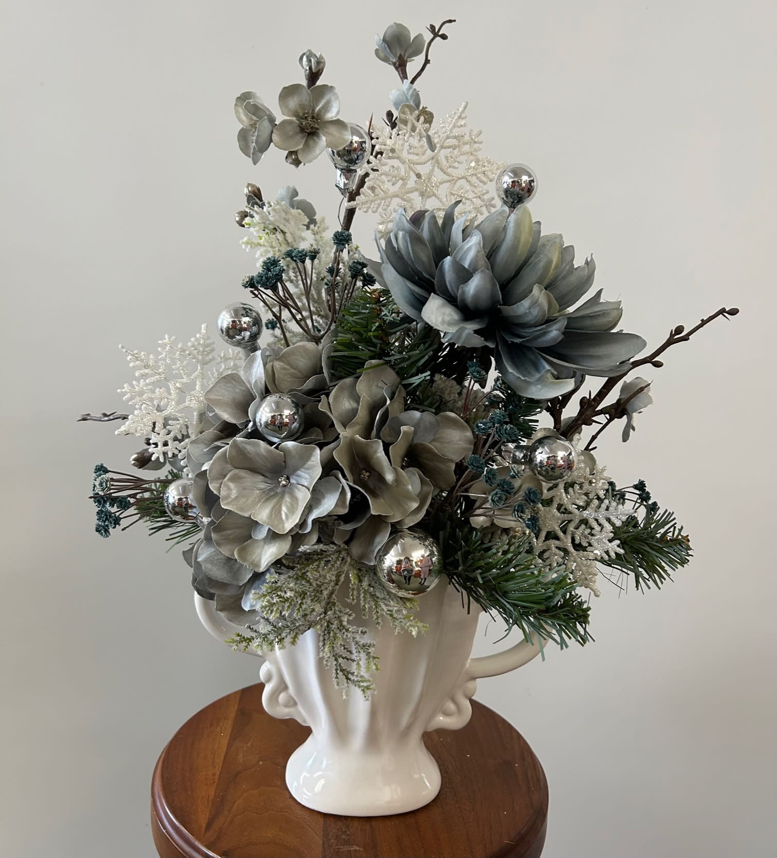 Snowflakes and Blooms Silk Arrangement - Blues, white, silver , and greens in white ceramic-all-around.