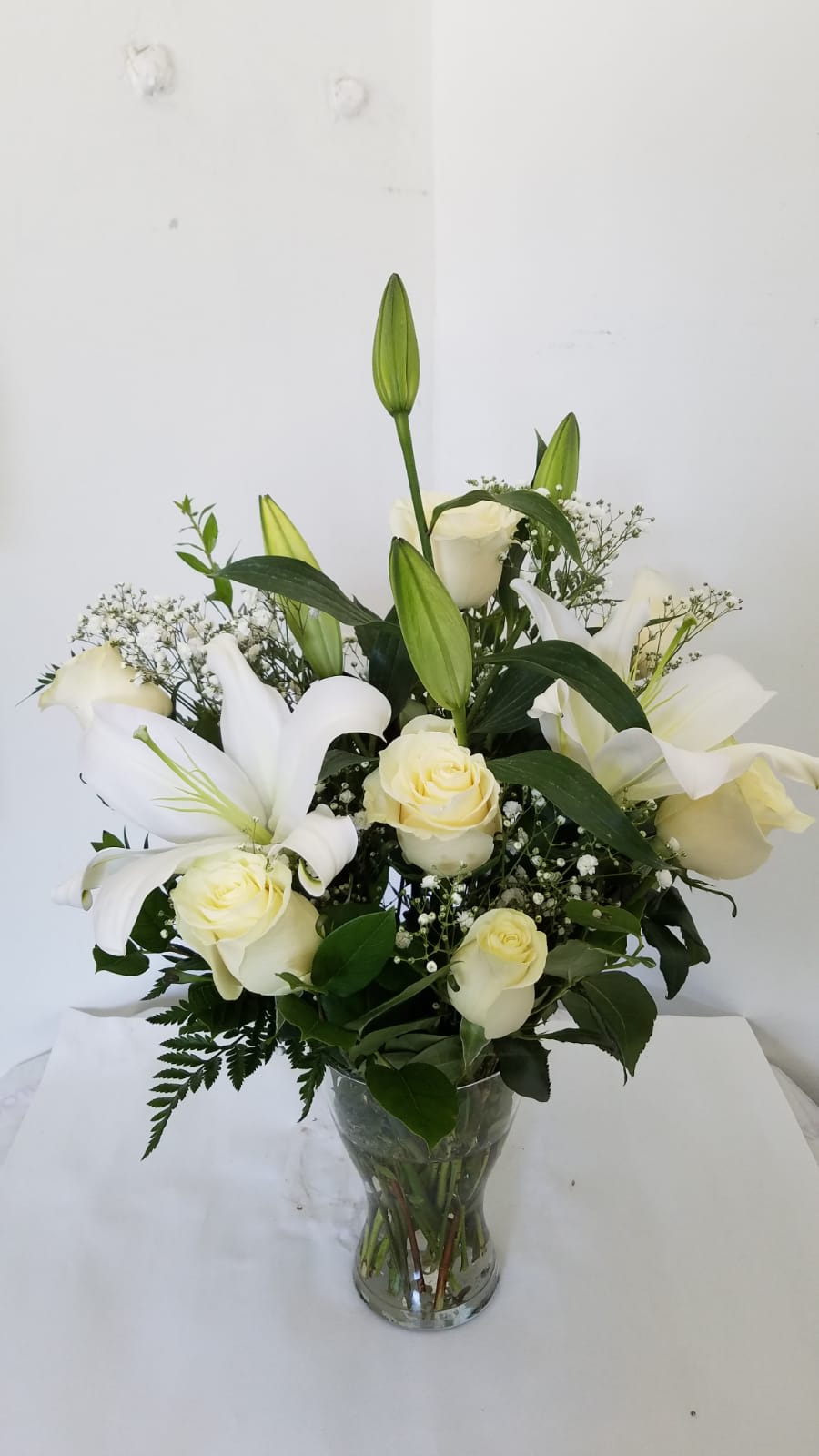 Life Well Lived  - This is made with  traditional Sympathy Flowers