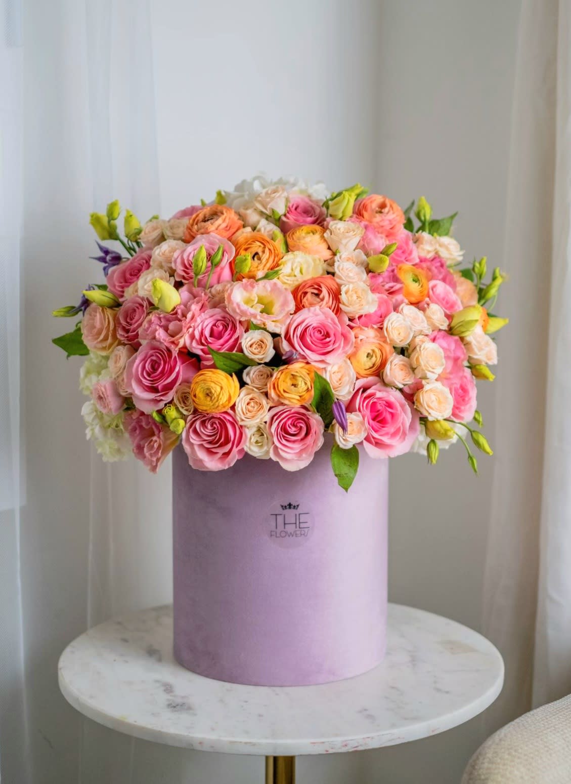 Make My Day - This is a gentle arrangement in warm shades of peach palette. It looks like dawn rays were embodied in it. Such a composition is suitable not only for a woman, but also for a man. It is appropriate to give it to a partner, as it has a special restraint. It is also suitable as a gift for a loved one who loves delicate shades. Arrangements in a hat box look elegant, stand out and pretend being &quot;&quot;novelties&quot;&quot; they switched into a respected classic.