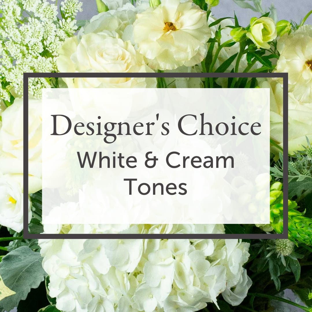 Designer's Choice - White &amp; Cream Tones - Trust our design team to create a gorgeous, one-of-a-kind, DESIGNER'S CHOICE fresh arrangement using premium blooms in WHITE &amp; CREAM TONES! Every arrangement is slightly different because our flower selection changes every day. We will choose from the day’s best selection of seasonal White &amp; Cream blooms, seasonal greenery, &amp; textural elements. Flower varieties &amp; range of color saturation will vary with every Designer’s Choice arrangement, but that is what makes them so special! We are known for our premium Ecuadorian roses and, when the season permits, we prioritize locally grown flowers. The arrangement will be delivered in a quality vase or container and packaged in our beautiful Andrew’s Garden gift bag. SEE OUR SIZING GUIDELINES and other details on the &quot;Our Blooms&quot; page of our website.