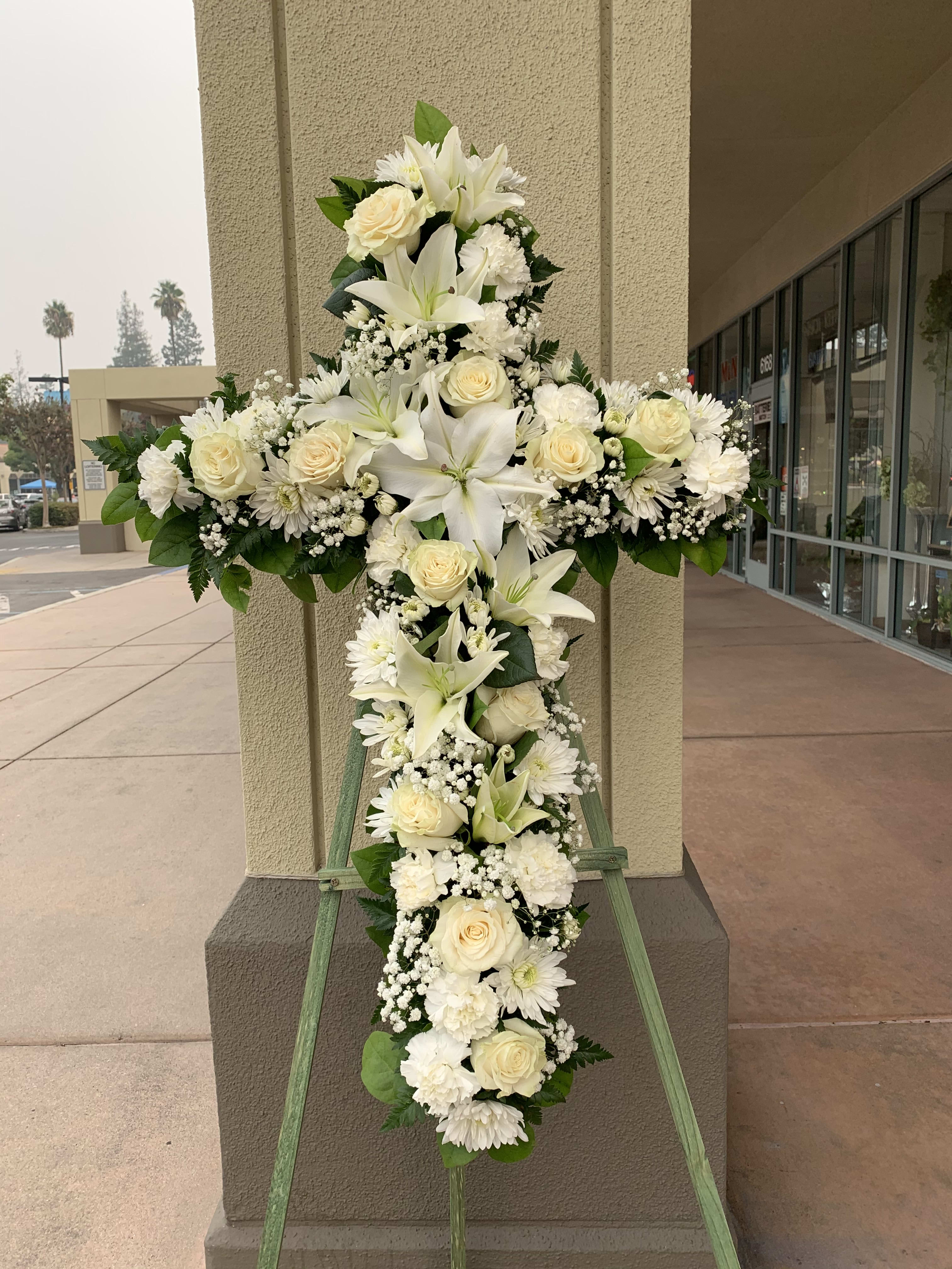 CR#06 Peaceful White Standing Cross - White Carnations Cross with Elegant Red Roses, baby's breath, and greens.  Standard: Cross 34&quot; H Premium: Cross 40&quot; H (as shown)