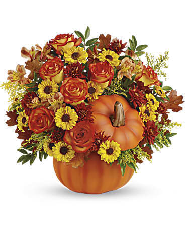 Teleflora's Warm Fall Wishes Bouquet Teleflora's Warm Fall Wishes Bouquet - fall flowers arranged in a ceramic pumpkin with the lid, perfect for a thanksgiving gathering. or to enjoy at home.