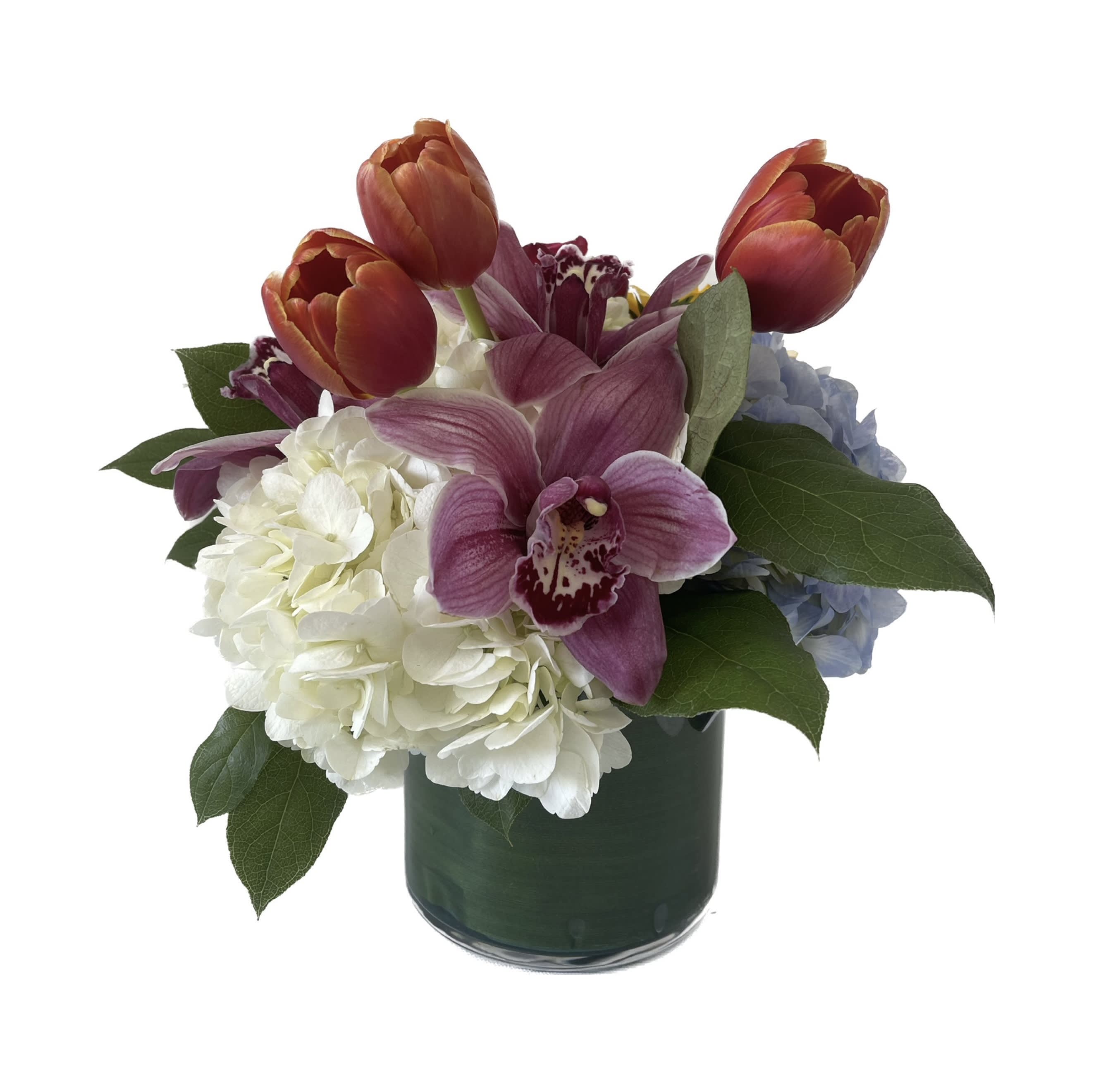 Hijo de luna Hijo de luna - Mix of Tulips, Roses, Hydrangeas and Cymbidium orchids arranged in a Cilinder.