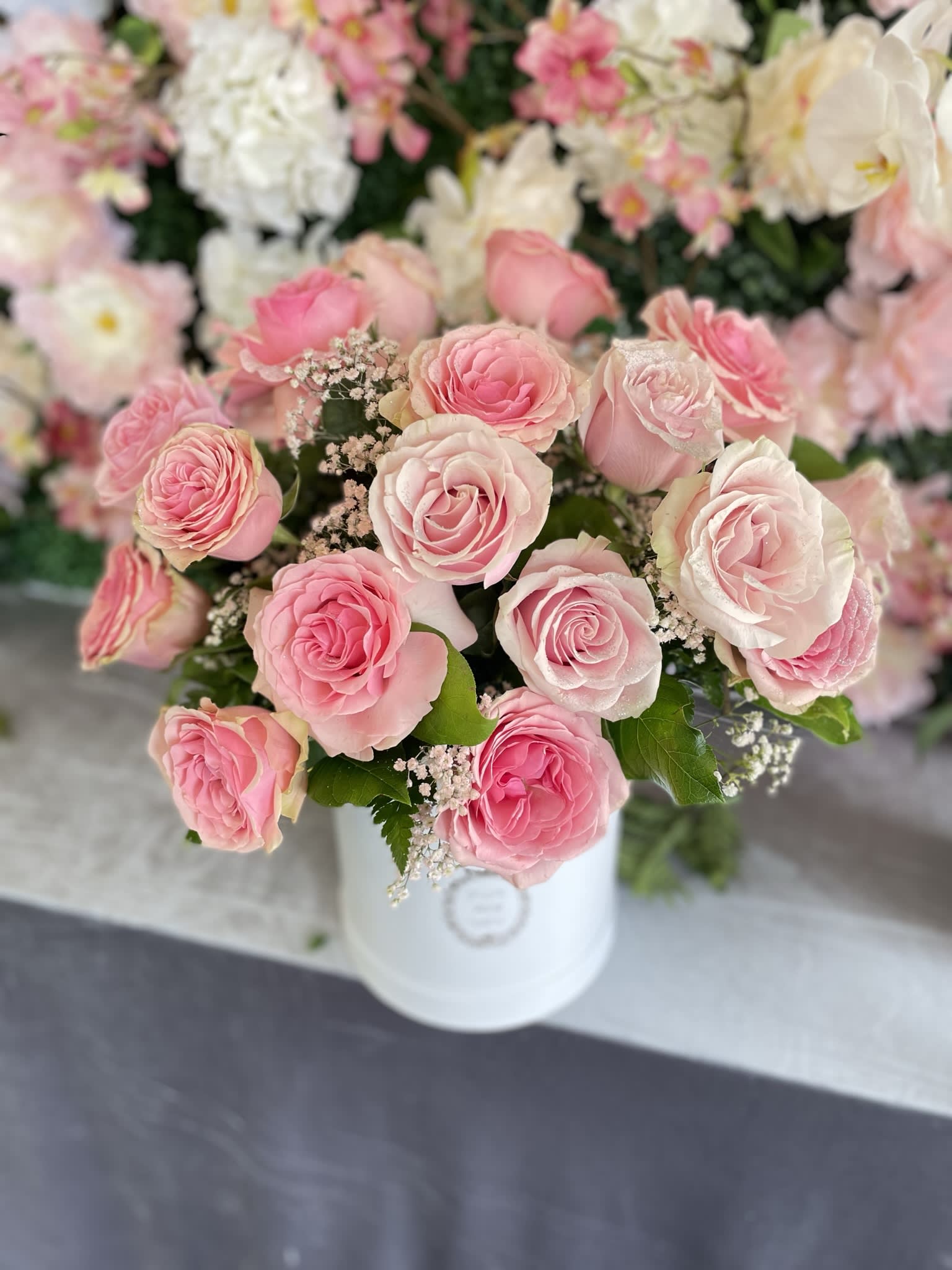 Geraldin - This gorgeous arrangement has some beautiful pink roses.