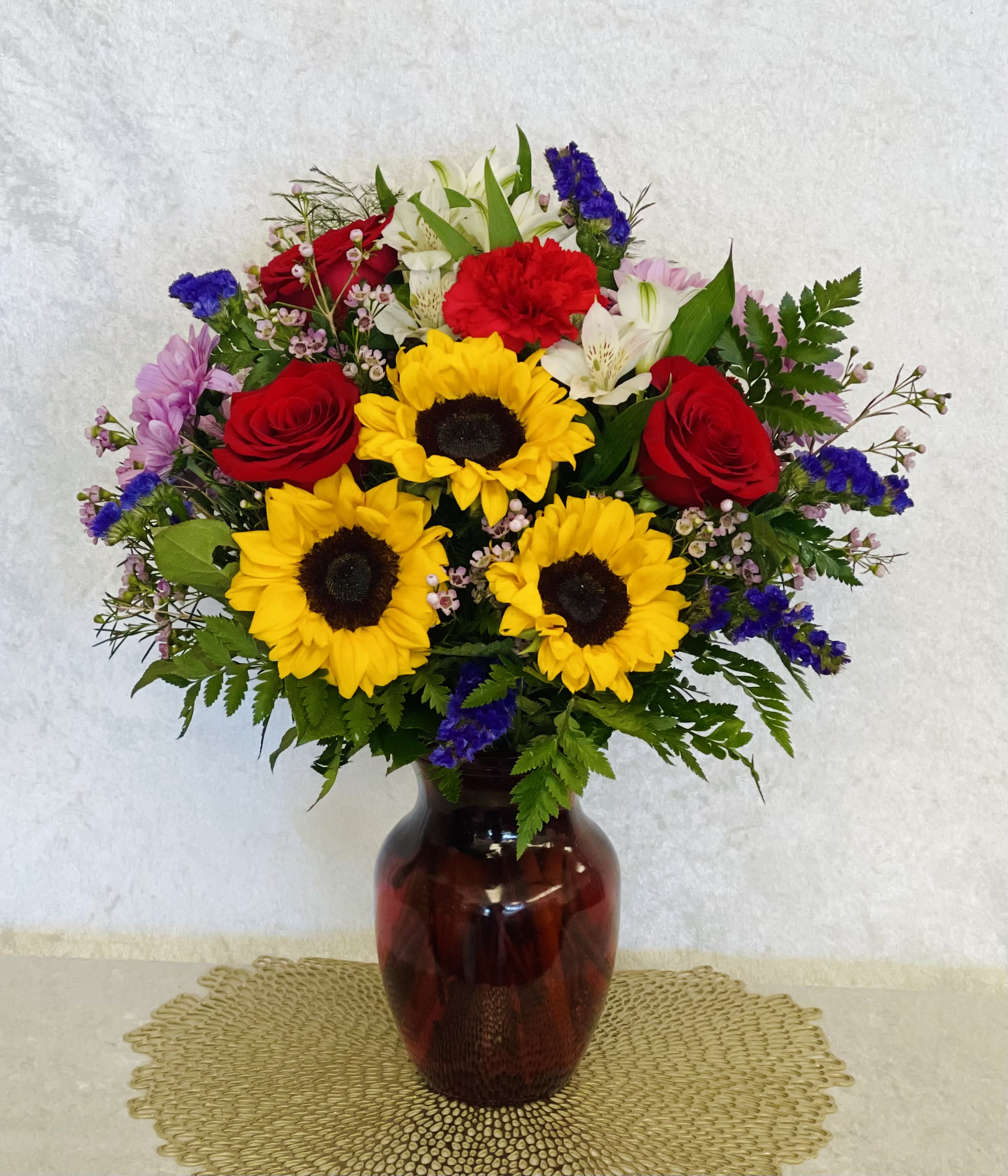 Pure Happiness Pure Happiness - There is warmth and radiance in our Pure Happiness arrangement. Bright the day of a loved one with this vibrant and beautiful bouquet.