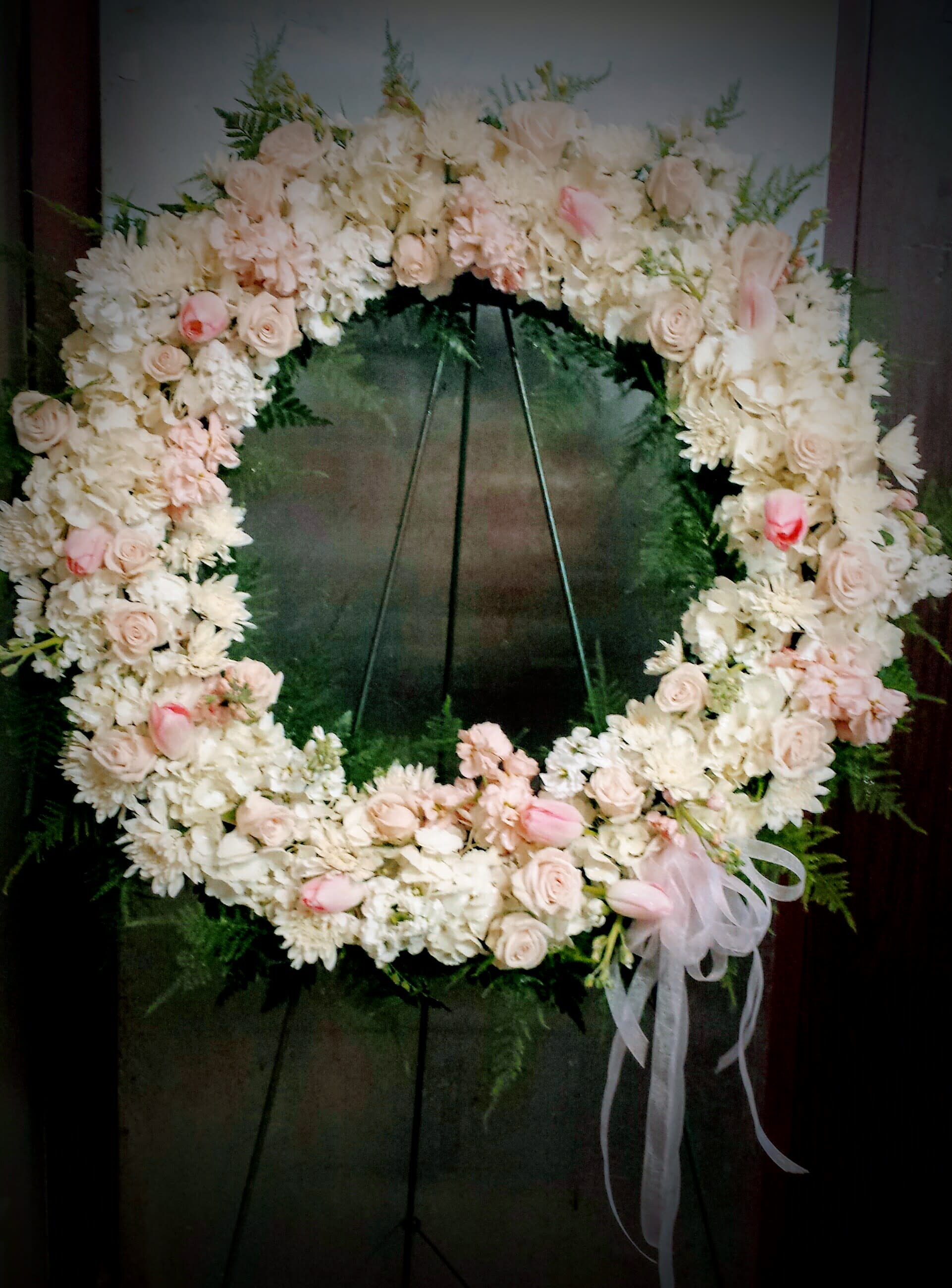 Blushing Serenity wreath  - A white and blush pink floral wreath, with it's soft and subtle petals are the perfect  tribute statement piece
