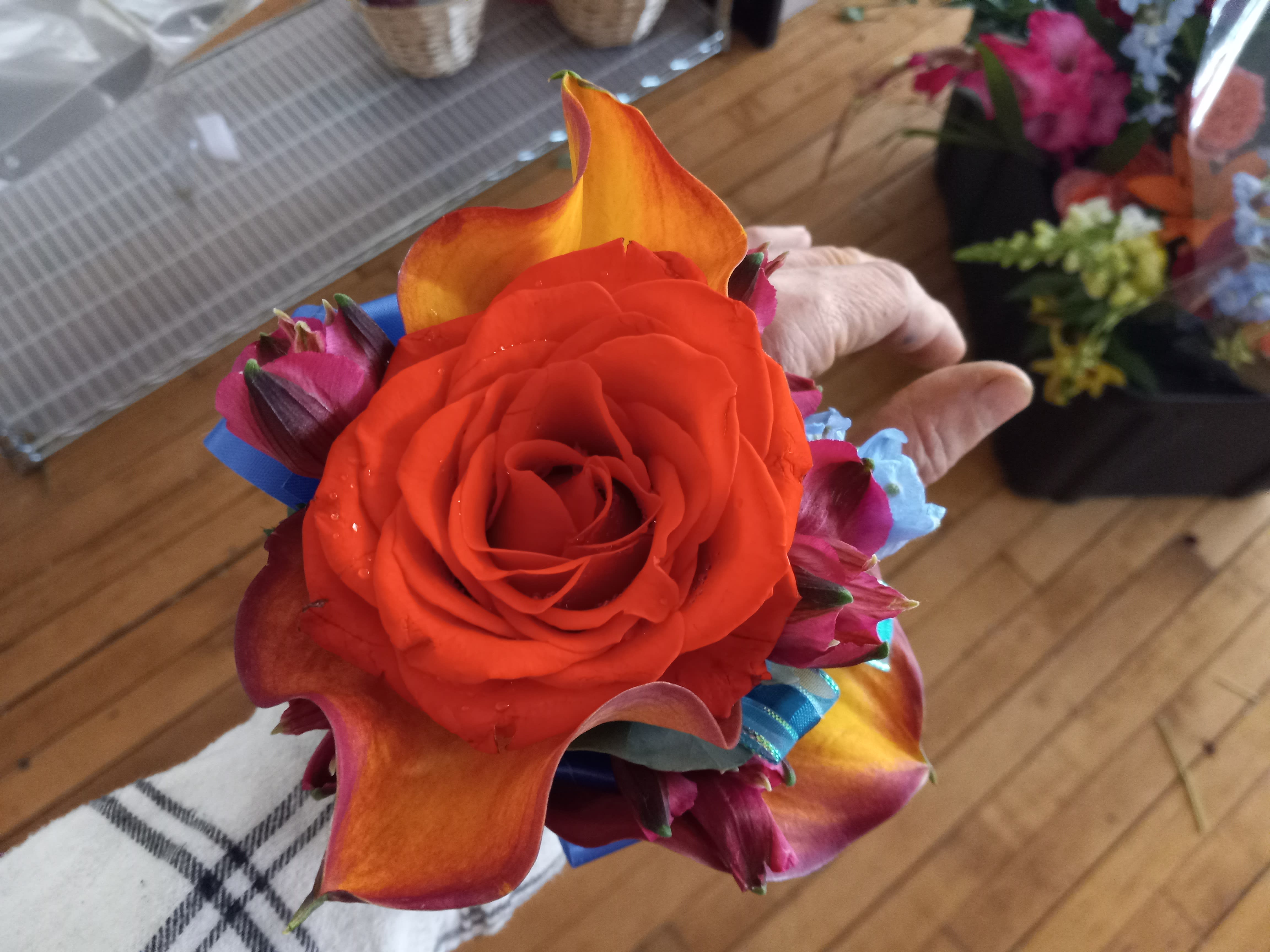 Ann's wedding corsages - Bright orange &amp; whimsical blue wedding corsage