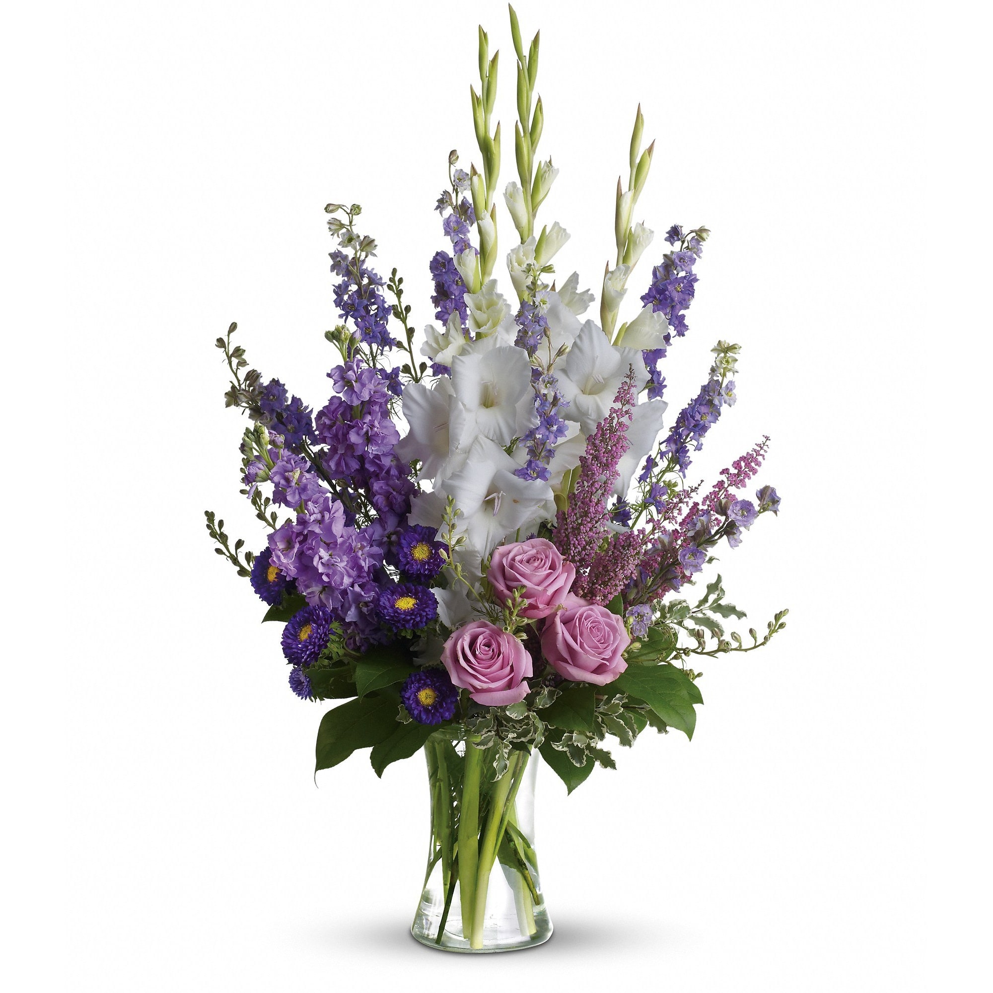Joyful Memory by Teleflora - Lavender and white sympathy flowers make a grand statement in this joyful bouquet. Cherish your memories with this lasting remembrance of lavender larkspur and roses, deep purple asters, pure white gladioli and the softest pink heather. 
