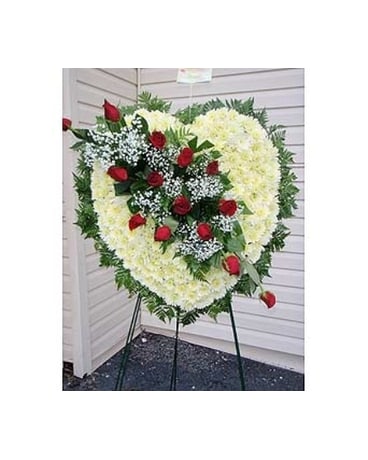Broken Heart Broken Heart - This heart shaped arrangement lends expression to grief over the loss of a loved one with beautiful white cushion poms and red roses. Designed on a 24" heart. Deluxe Version has 2 Dozen Roses Premium Version has 3 Dozen Roses FCS-613