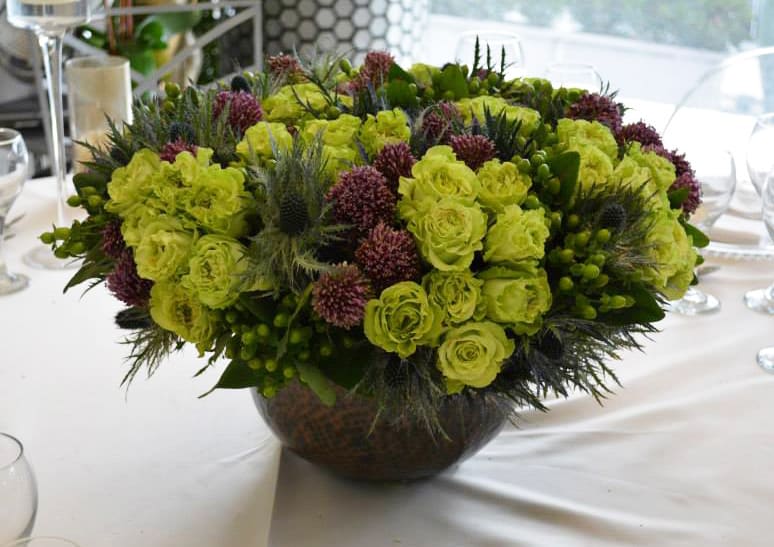 Green Medici - A combination of green roses whimsically composed with coffee berries and thistle. 