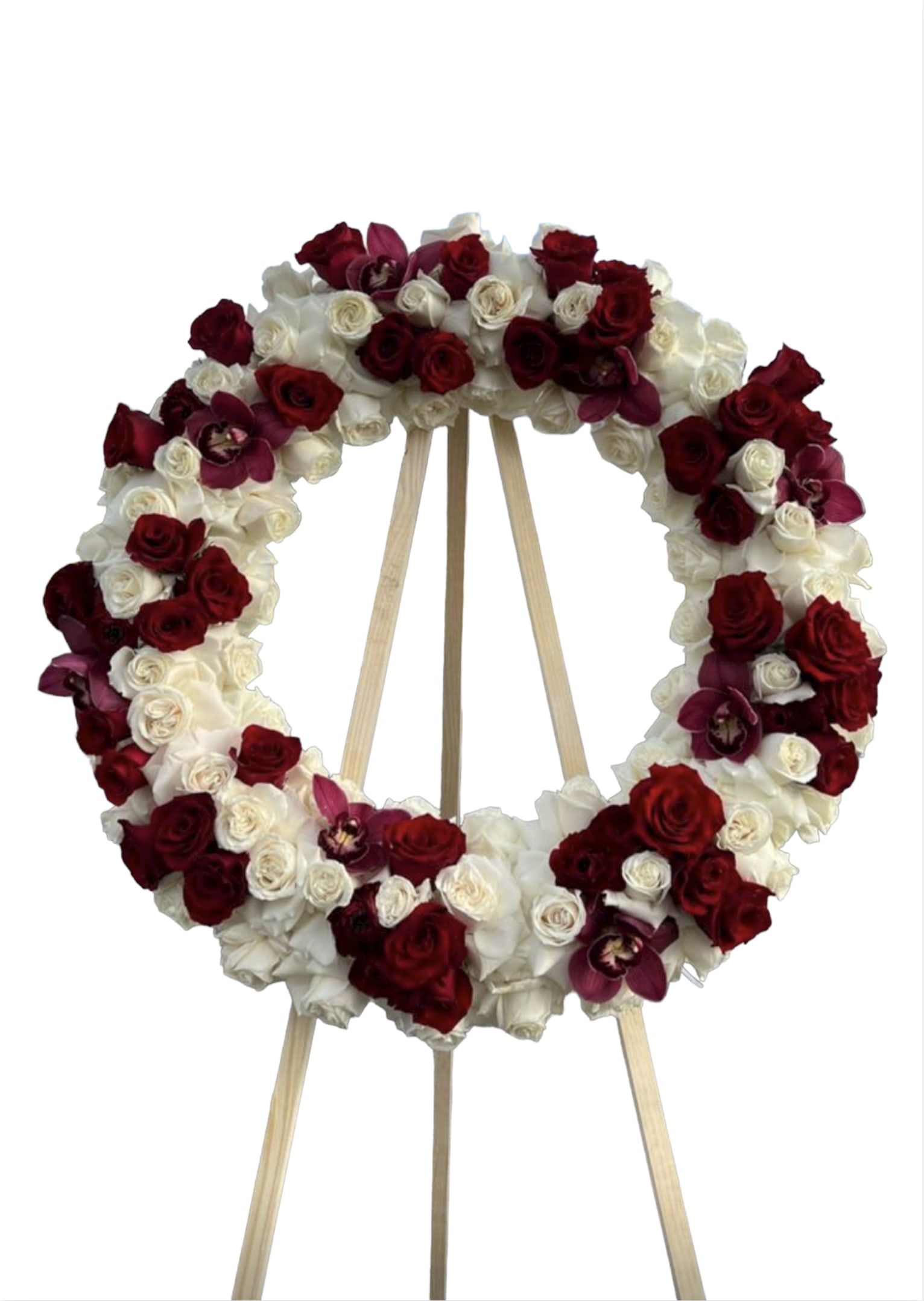 Circle of Life Circle of Life - This funeral arrangement is a wreath comes with the following florals; roses and orchids.