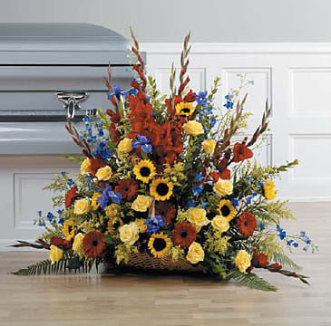 Triadic Fireside Basket in Red, Yellow and Blue - Gerber Daisies, gladiola Iris, Delphinium, roses sunflowers and solidago