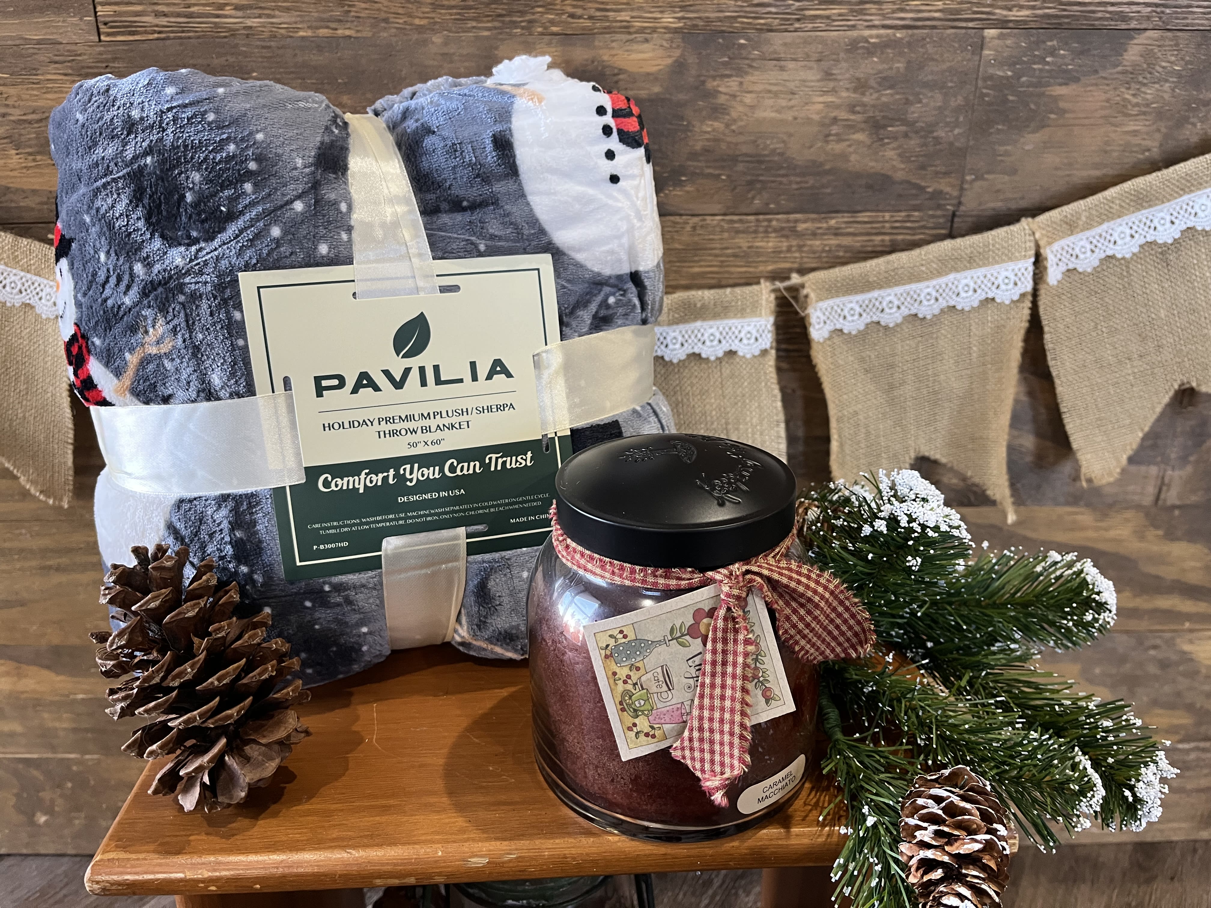 Warm Wishes  - Send some warmth and comfort this Holiday Season with a plush blanket and a warm seasonal scented candle! 