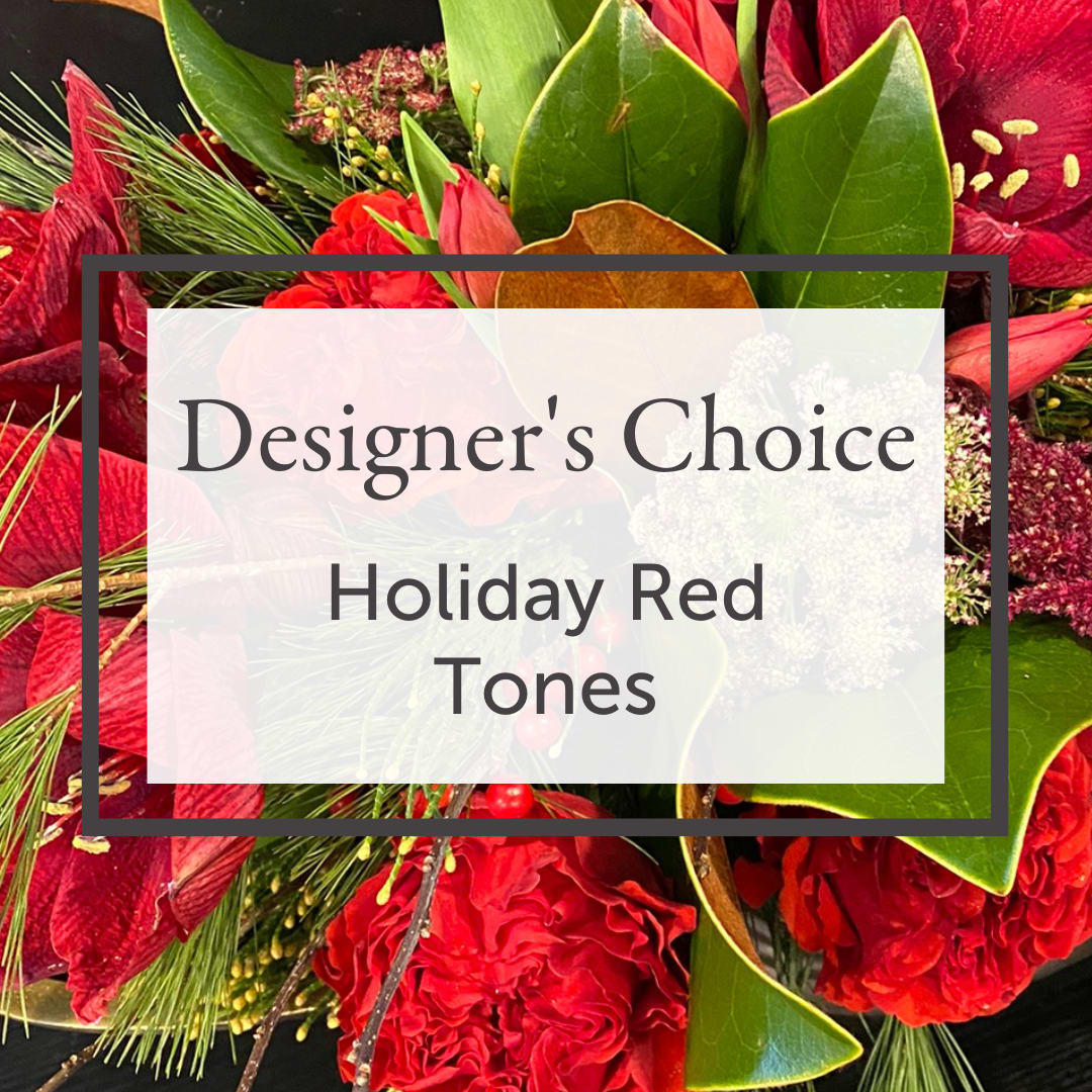 Designer's Choice - Holiday Red Tones - Trust our design team to create a gorgeous, one-of-a-kind, DESIGNER'S CHOICE fresh arrangement using premium HOLIDAY SEASONAL RED BLOOMS! Anything goes in this arrangement because you love everything we do! Every arrangement is completely unique. We will choose from the day’s best selection of HOLIDAY SEASONAL RED BLOOMS, seasonal greenery, &amp; textural elements. Flower varieties &amp; range of color saturation will vary with every Designer’s Choice arrangement, but that is what makes them so special! We are known for our premium Ecuadorian roses and, when the season permits, we prioritize locally grown flowers. The arrangement will be delivered in a quality vase or container and packaged in our beautiful Andrew’s Garden gift bag. SEE OUR SIZING GUIDELINES and other details on the &quot;Our Blooms&quot; page of our website.