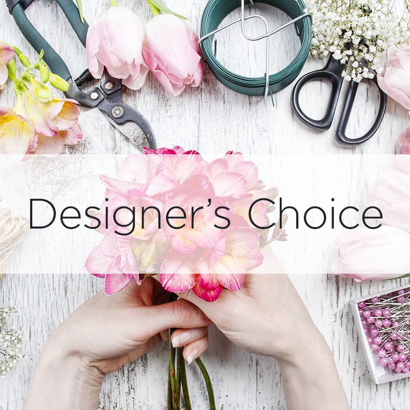 Designer's Choice Showy - Let us choose the freshest flowers from our cooler focusing on using the highest quality flowers and statement designs. We will do our best to meet any special requests for color or flowers. 
