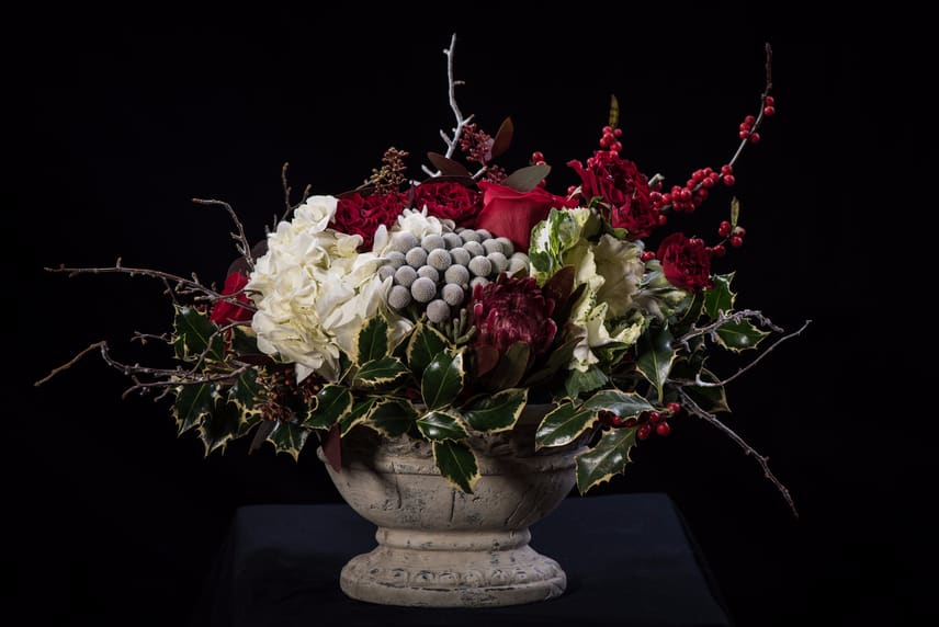 Everlasting Love Everlasting Love - Composed of hydrangeas, roses, berries, protea, holly green, flocked branches.