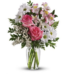 What a Treat Bouquet with Roses What a Treat Bouquet with Roses - This lovely bouquet of pink roses, pink alstroemeria and white mums in a sparkling clear glass vase is truly a feast for the eyes. It is an inspired choice for brightening a birthday, anniversary or any special occasion. They'll think it's ahhh-some. This beautiful bouquet incudes pink roses, pink alstroemeria, white daisy spray chrysanthemums and white statice accented with assorted greenery. Delivered in a clear glass vase. Approximately 12 3/4" W x 17" H Orientation: One-Sided