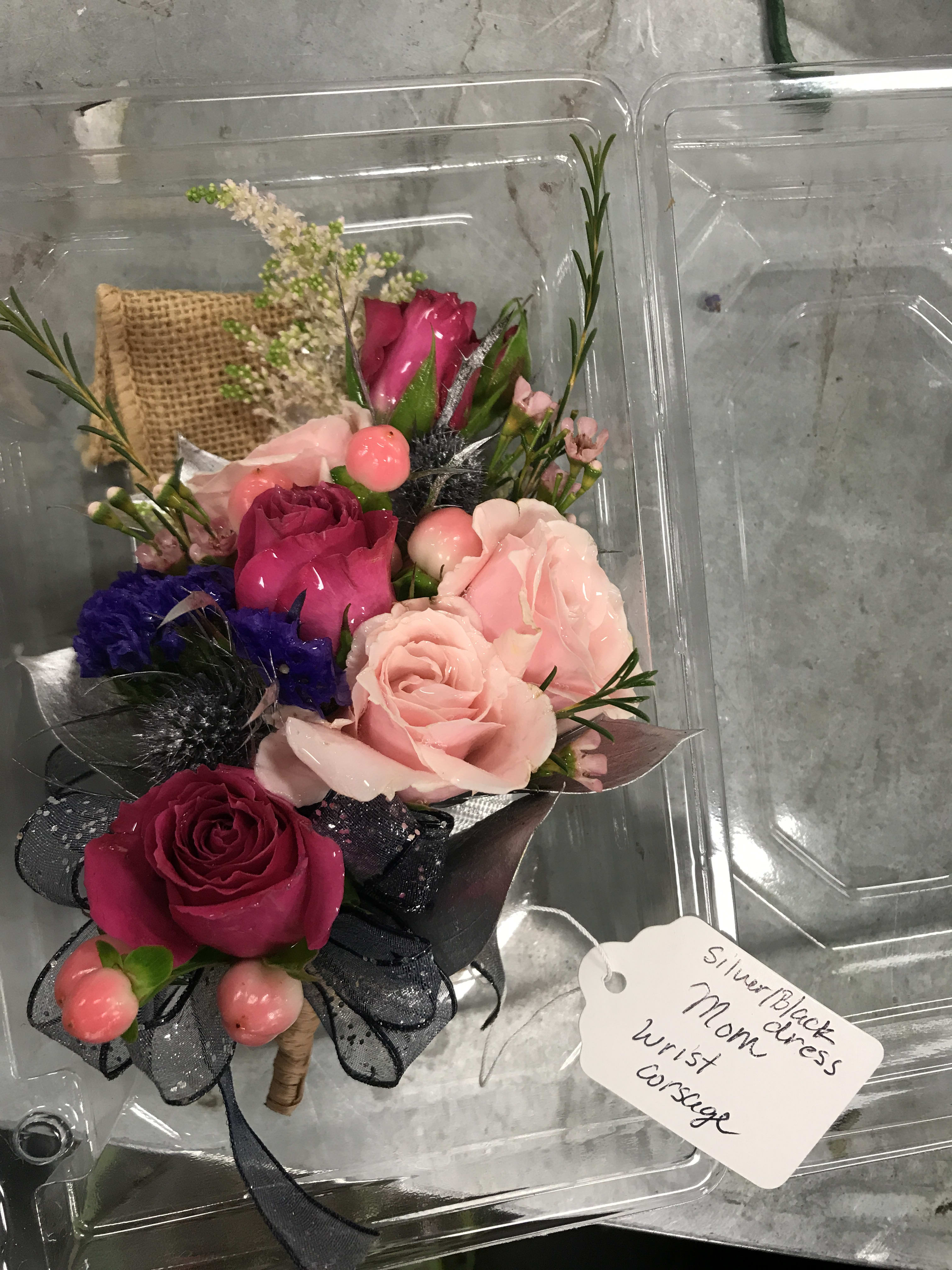 Garden rose wrist corsage - Spray roses and fillers artfully placed