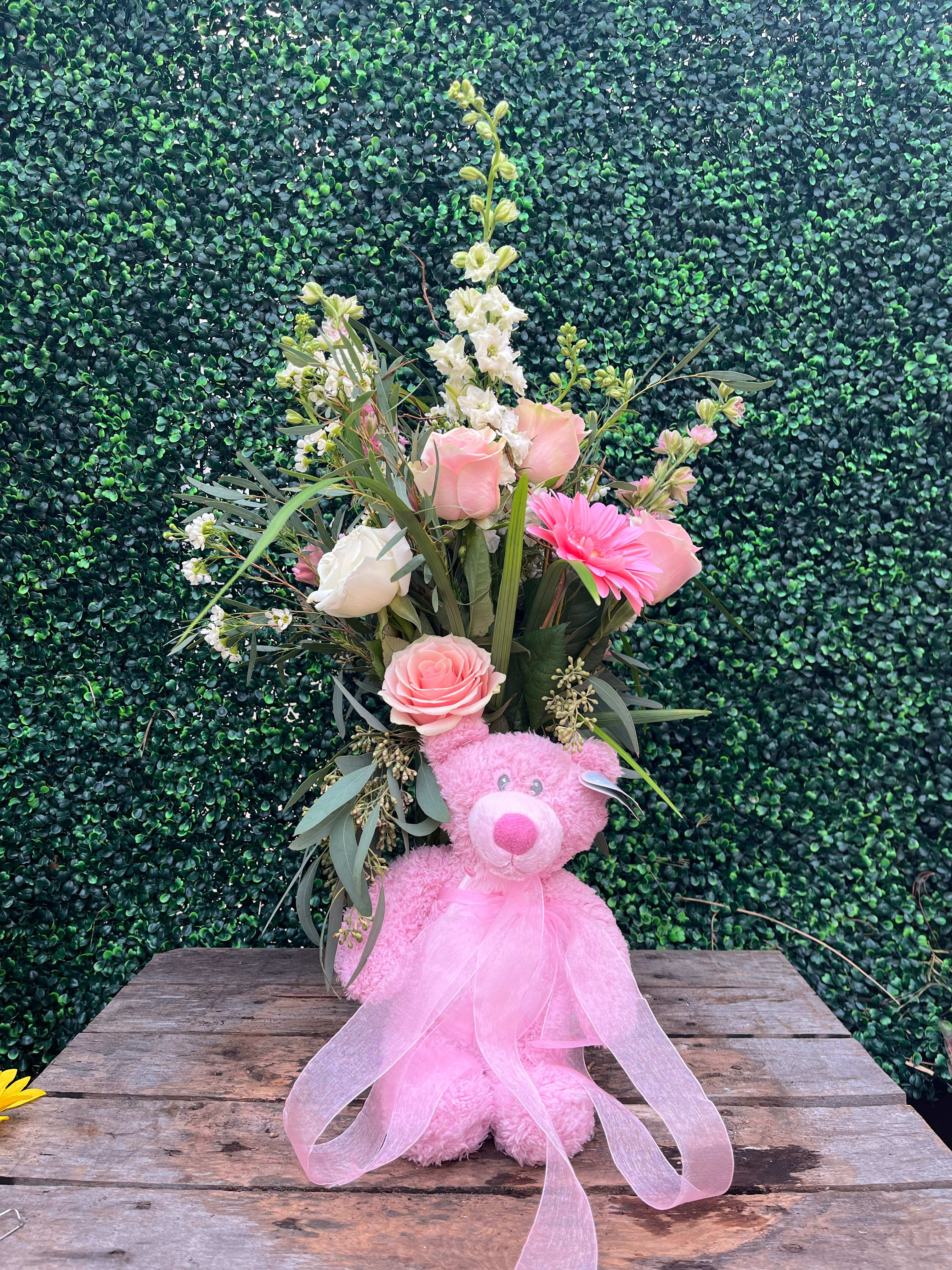 It's A Girl! - It's A Girl is pink and white mixed flowers. Balloons and teddy bear can be added! Please select Deluxe for 2 balloons and Premium for balloons and a teddy bear, or call the shop! *Substitutions may be applied*