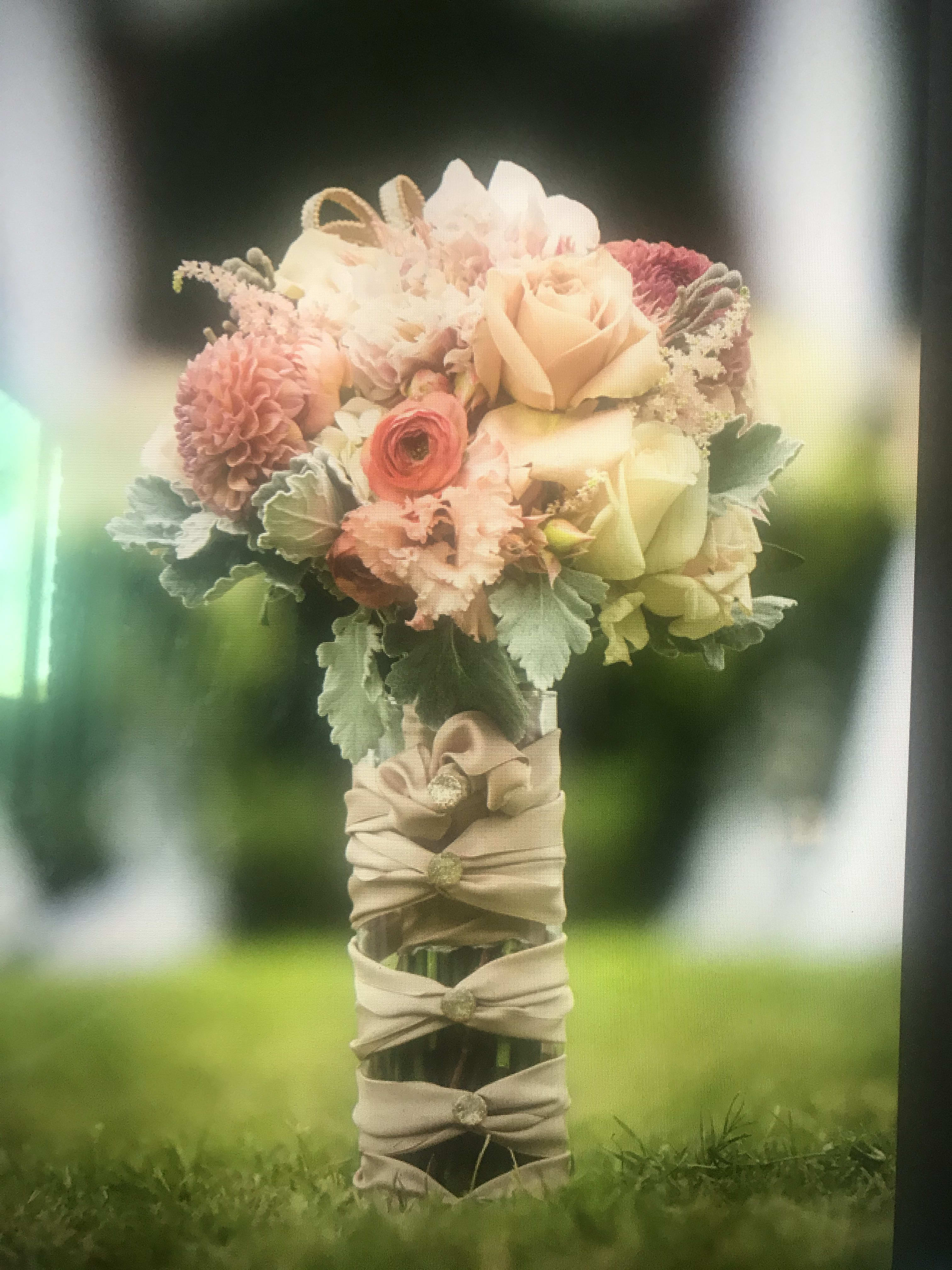 Bride's Bouquet in a Juliet Vase - This soft and romantic bouquet is filled with breathtakingly beautiful floral...rich in textures.  If you like premium roses, dahlias and fillers, this bouquet is for you! It comes with a juliet-wrapped vase so you can display your bouquet throughout your wedding day.