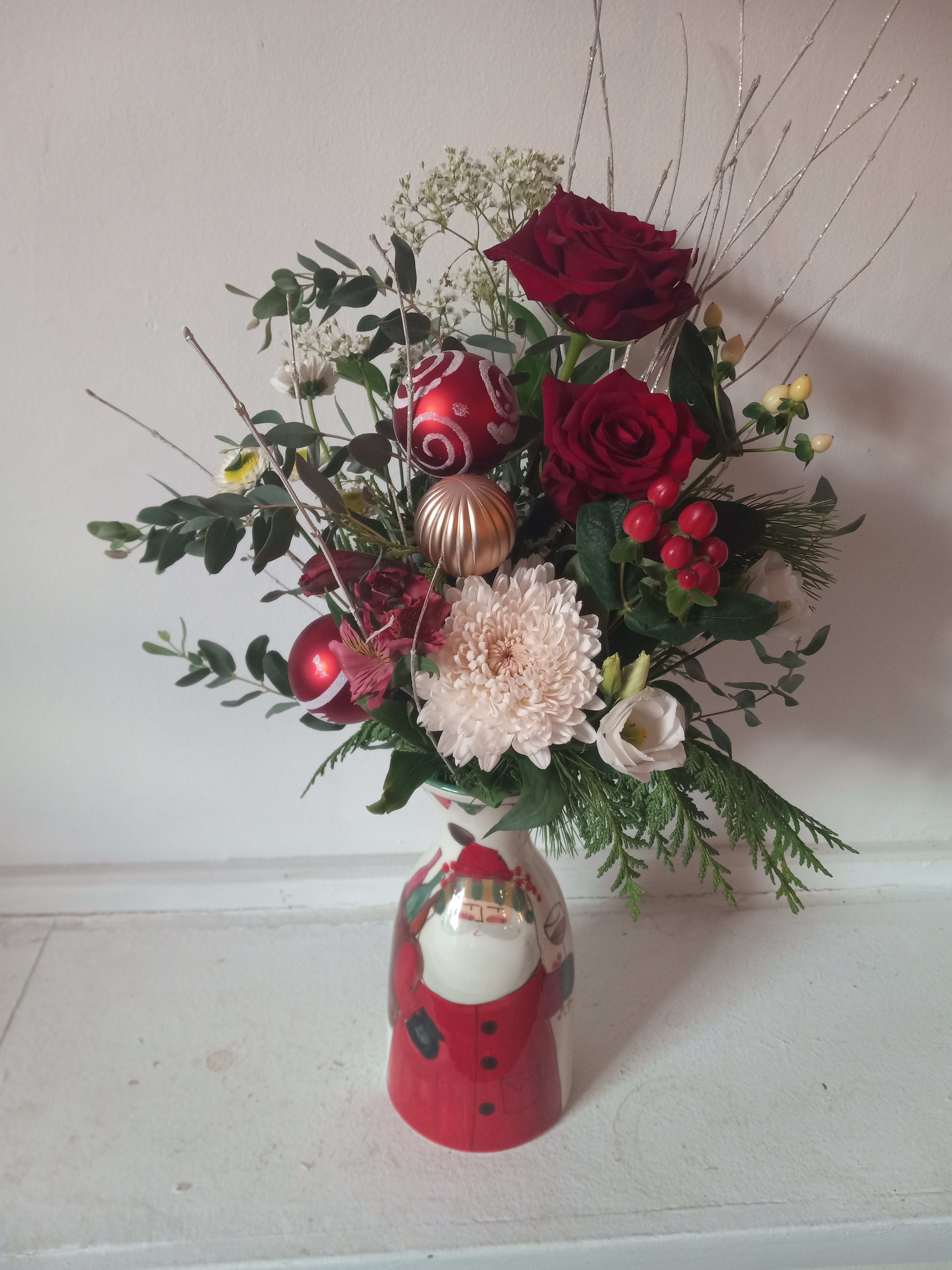 From Exclusive Collection: Santa vine or oil pitcher with flowers - Unique hand painted in Italie &quot;Santa&quot; vine/oil pitcher with Christmas fresh flowers arrangement will make lasting impression as an exclusive and useful gift.