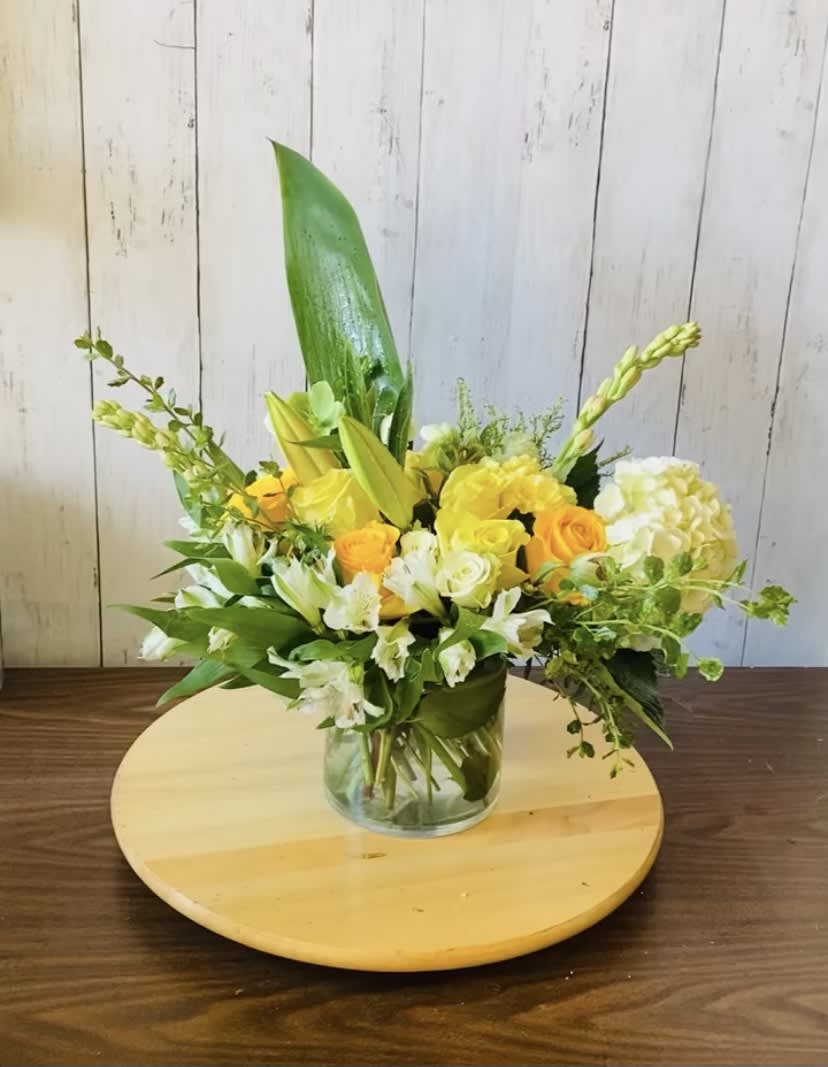 Sunny Bun - Bright yellow and white flower arrangement good for any occasion