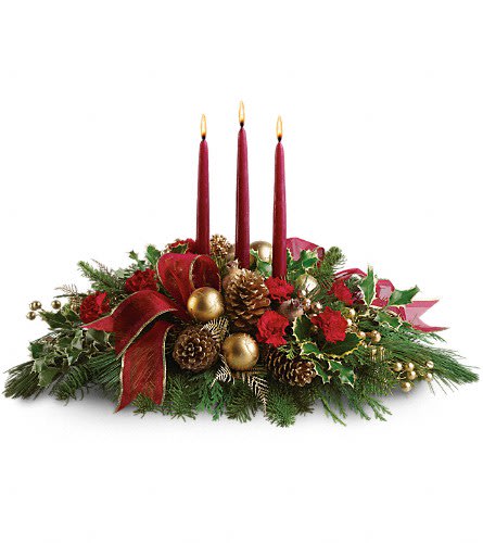 All is Bright All is Bright - All will be bright this season when you order this joyful Christmas arrangement. A lovely centerpiece it will light up the holiday festivities beautifully. Miniature carnations are artfully on display with merry touches like shimmery ornaments pinecones berries organza ribbon and holiday greens. Three graceful red taper candles add the perfect magical touch.Approximately 23" W x 16" H Orientation: All-Around As Shown : T114-1ADeluxe : T114-1BPremium : T114-1C
